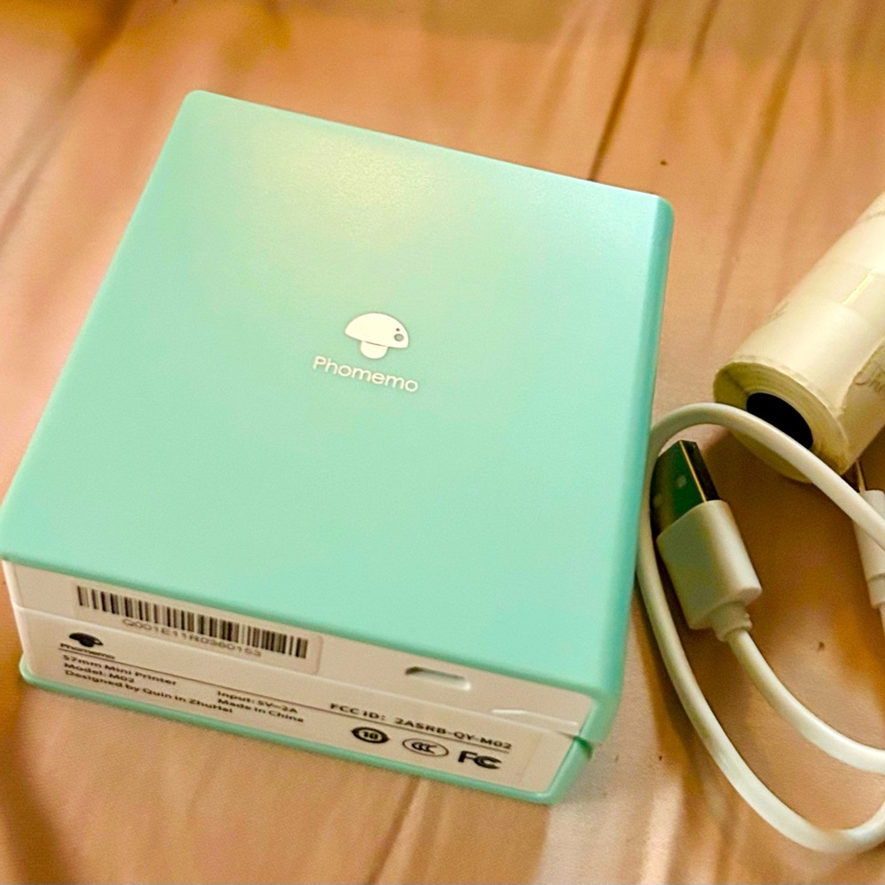 Phomemo  label printers.  come with charger and paper